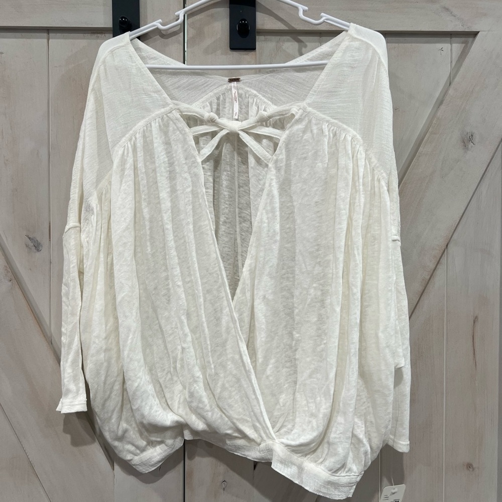 Free people NWT white blouse.